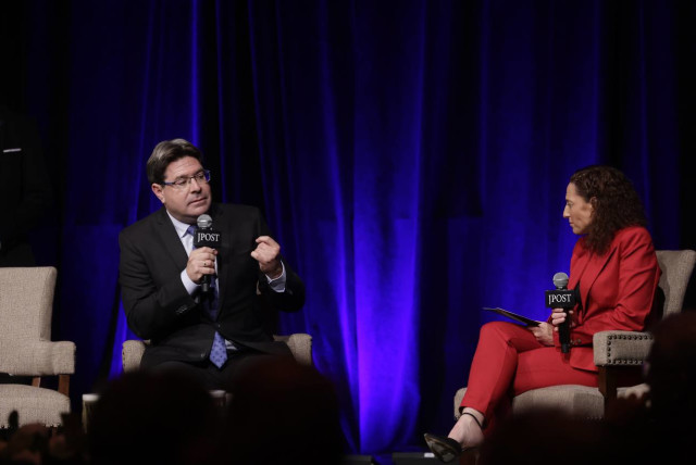  Israeli Innovation, Science, and Technology Minister Ofir Akunis is seen speaking to Maayan Hoffman at The Jerusalem Post Annual Conference, on June 5, 2023. (credit: MARC ISRAEL SELLEM/THE JERUSALEM POST)