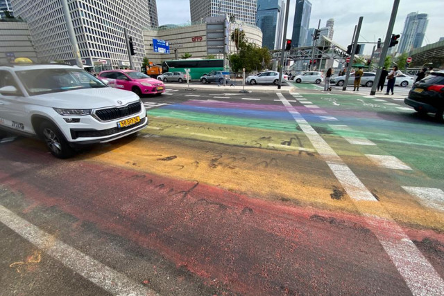  Left-wing protesters took to the streets on Thursday morning before festivities began, painting the intersection of Kaplan St. and Menachem Begin St. with the rainbow pride colors and wrote: ''There is no pride in dictatorship.'' (credit: AVSHALOM SASSONI/MAARIV)