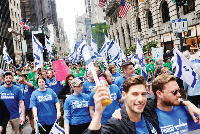  MARCHERS PARTICIPATE in the Celebrate Israel Parade in New York on Sunday.  (credit: MARC ISRAEL SELLEM/THE JERUSALEM POST)