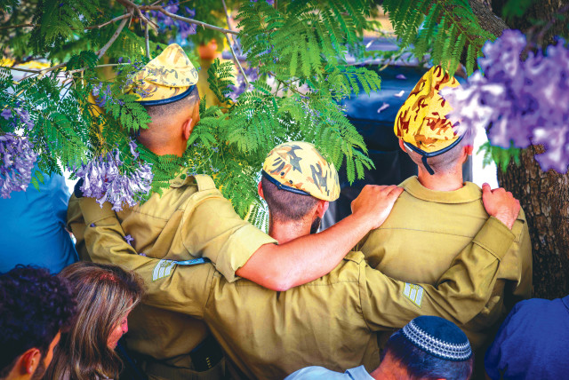  SOLDIERS ATTEND the funeral of St.-Sgt. Ori Itzhak Ilouz who was killed during the shooting attack on the Egyptian border. (photo credit: David Cohen/Flash90)