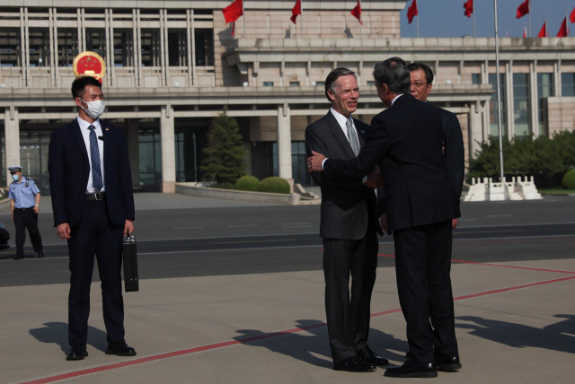 US Secretary of State Antony Blinken is welcomed by U.S. Ambassador to China Nicholas Burns and Director General of the Department of North American and Oceanian Affairs of the Foreign Ministry Yang Tao, as he arrives in Bejing, China, June 18, 2023. (credit: REUTERS/LEAH MILLIS/POOL)