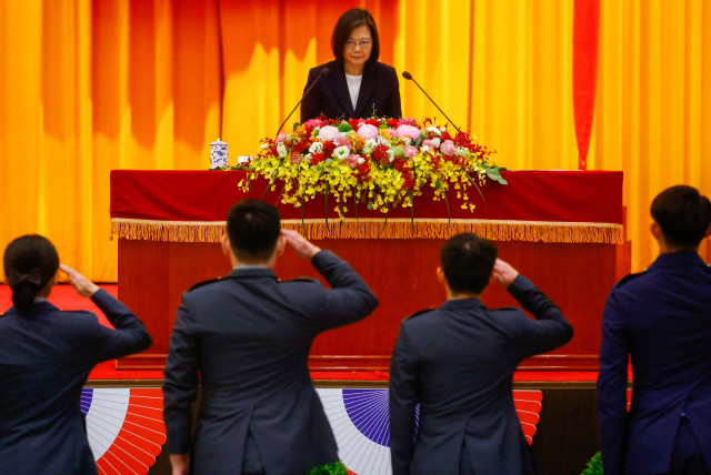  Students salute Taiwan's President Tsai Ing-wen during a graduation ceremony at the National Defense University in Taipei, Taiwan June 21, 2023. (credit: ANN WANG/REUTERS)