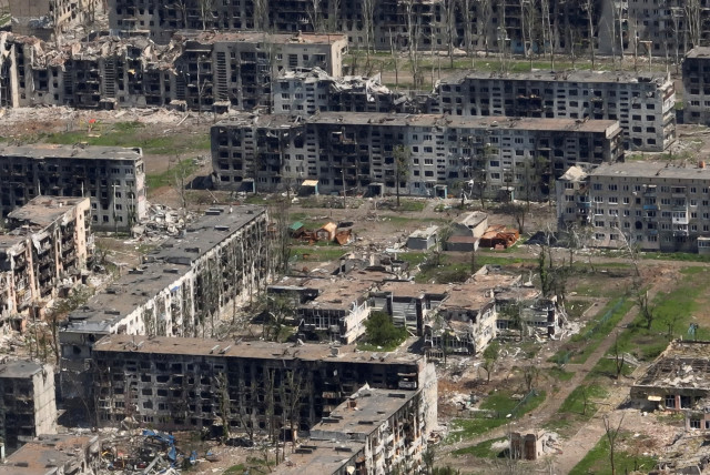  Aerial view shows destroyed buildings as a result of intense fighting, amid the Russian invasion, in Bakhmut, Ukraine in this still image from handout video released June 15, 2023 (credit: REUTERS)