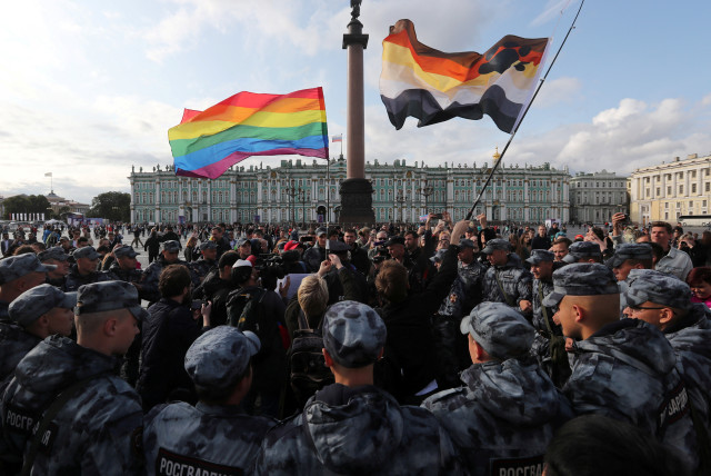 Law enforcement officers block participants of the LGBT community rally ''X St.Petersburg Pride'' in central Saint Petersburg, Russia August 3, 2019 (credit: REUTERS/ANTON VAGANOV)
