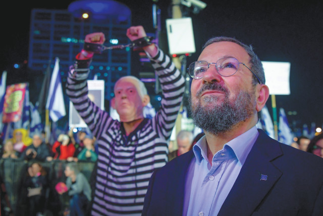  FORMER PRIME minister Ehud Barak participates in a protest against the government’s planned judicial reform in February.  (photo credit: AVSHALOM SASSONI/FLASH90)