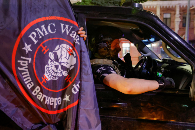  Fighters of Wagner private mercenary group pull out of the headquarters of the Southern Military District to return to base, in the city of Rostov-on-Don, Russia, June 24, 2023 (credit: REUTERS/ALEXANDER ERMOCHENKO)