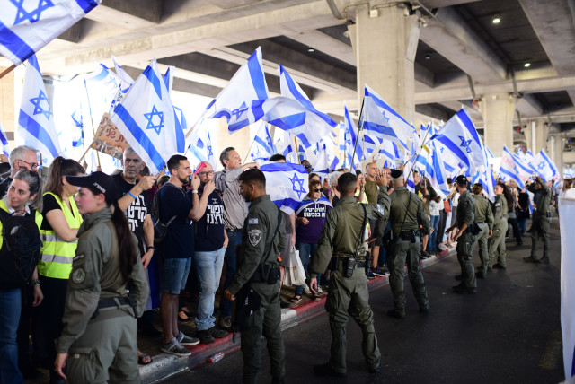 Israelis protest and clash with police during a protest against the Israeli government's planned judicial overhaul, at the Ben Gurion Airport near Tel Aviv, July 3, 2023 (credit: TOMER NEUBERG/FLASH90)