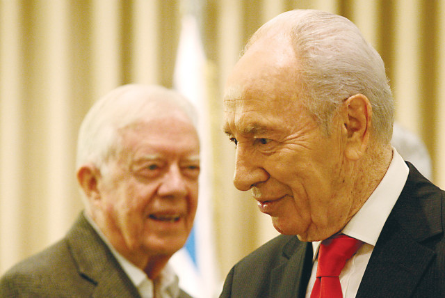  THEN-PRESIDENT Shimon Peres meets with former US president Jimmy Carter, in Jerusalem, in 2009. Successive president have tried to duplicate Carter's achievement, but only a few come close to matching the scope of his breakthrough, says the writer.  (credit: ABIR SULTAN/FLASH90)