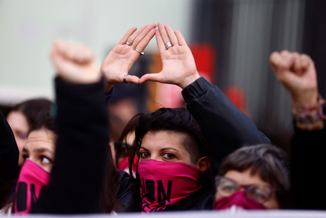 Women demonstrate on International Women's Day, as they strike to demand the end to domestic and racist violence, wars and the country's prevailing ''macho'' culture, in Rome, Italy, March 8, 2023. (credit: YARA NARDI / REUTERS)