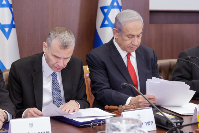  Israeli Prime Minister Benjamin Netanyahu (R) and Justice Minister Yariv Levin are seen at a cabinet meeting in Jerusalem, on July 9, 2023. (credit: MARC ISRAEL SELLEM/THE JERUSALEM POST)