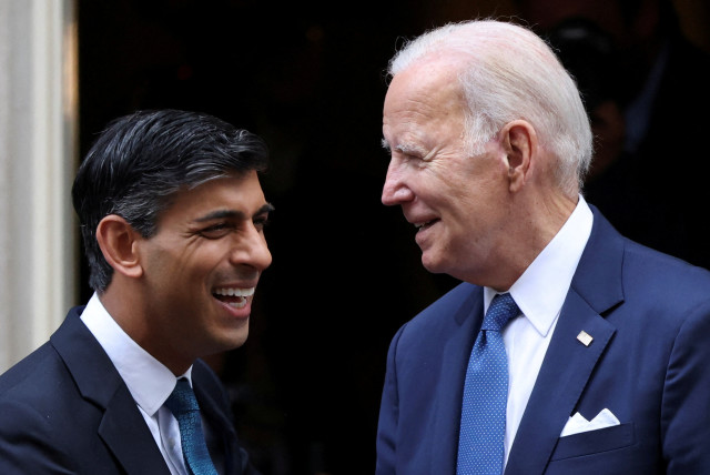  British Prime Minister Rishi Sunak and U.S. President Joe Biden react after their meeting at 10 Downing Street in London, Britain, July 10, 2023. (credit:  REUTERS/HOLLIE ADAMS TPX IMAGES OF THE DAY)