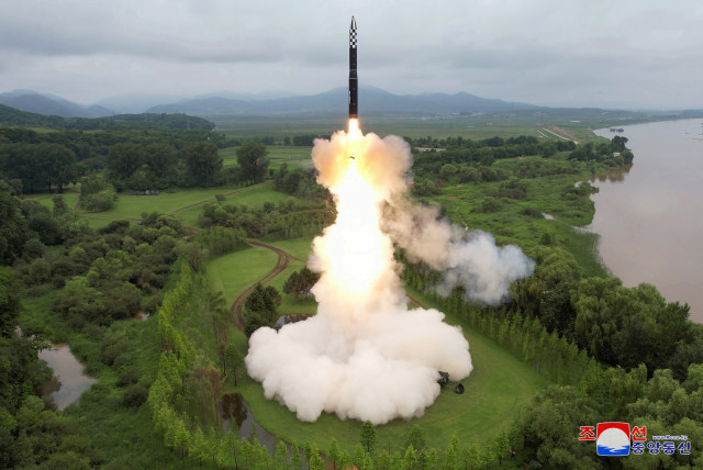 Hwasong-18 intercontinental ballistic missile is launched from an undisclosed location in North Korea in this image released by North Korea's Korean Central News Agency on July 13, 2023. (credit: KNCA/REUTERS)