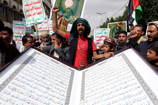  People rally to denounce the burning of the Koran in Sweden and the Israeli military operation in the West Bank city of Jenin, in Sanaa, Yemen July 4, 2023.  (credit: REUTERS/Khaled Abdullah TPX IMAGES OF THE DAY)