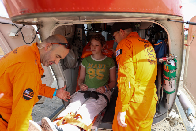  A young cancer patient named Raaya from the periphery is seen boarding a United Hatzalah helicopter to get treatment. (credit: UNITED HATZALAH‏)