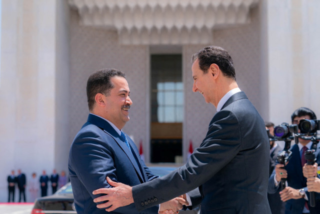  Syria's President Bashar al-Assad greets Iraqi Prime Minister Mohammed Shia Al-Sudani in Damascus, Syria July 16, 2023. (credit: SANA/HANDOUT VIA REUTERS)