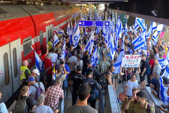  Israelis flood train stations as a part of 'Day of Resistance' protests across Israel on July 18, 2023 (credit: AVSHALOM SASSONI/MAARIV)