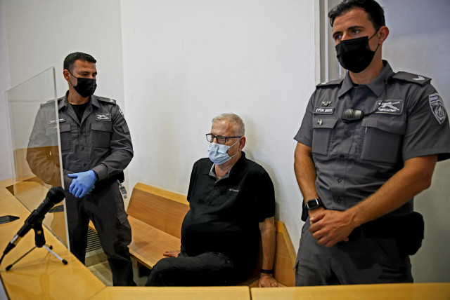  Giora Praff Perry, accused of murdering his wife, Esti Ahronovitz arrives for a court hearing the at the Beer Sheva District Court, southern Israel, on June 7, 2021. (credit: FLASH90)