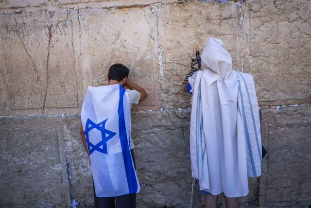  Anti-judicial overhaul activists attend a special prayer at the Western Wall in Jerusalem's Old City, on July 23, 2023. Photo by Chaim Goldberg/Flash90 (credit: Chaim Goldberg/Flash90)