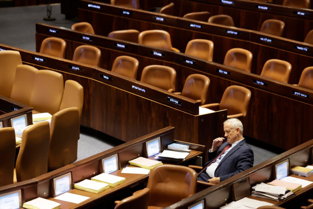  National Unity Party head Benny Gantz sits in the Knesset Plenum ahead of Monday's reasonableness standard bill, July 23, 2023.  (credit: MARC ISRAEL SELLEM/THE JERUSALEM POST)