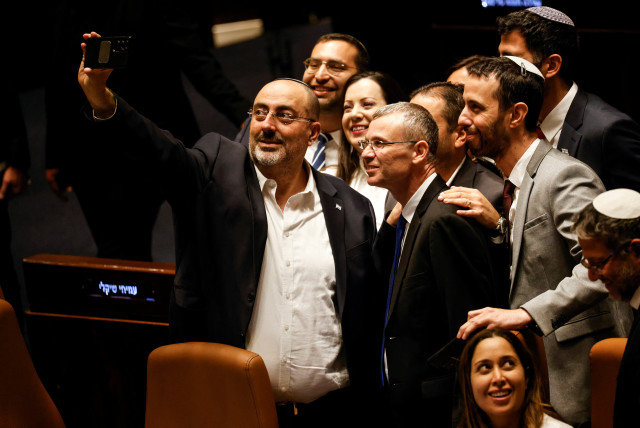  Israeli lawmakers take a selfie in the Knesset plenum following a vote on a bill that would limit some Supreme Court power, in Jerusalem July 24, 2023. (credit: AMIR COHEN/REUTERS)