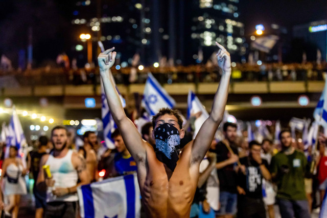  Israelis are seen protesting against judicial reform after the passage of the Law to Cancel the Reasonableness Standard, on July 24, 2023. (credit: ODED ANGEL)