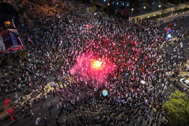 An aerial view shows protesters during a demonstration following a parliament vote on a contested bill that limits Supreme Court powers to void some government decisions, in Jerusalem July 24, 2023. (credit: REUTERS/ILAN ROSENBERG)