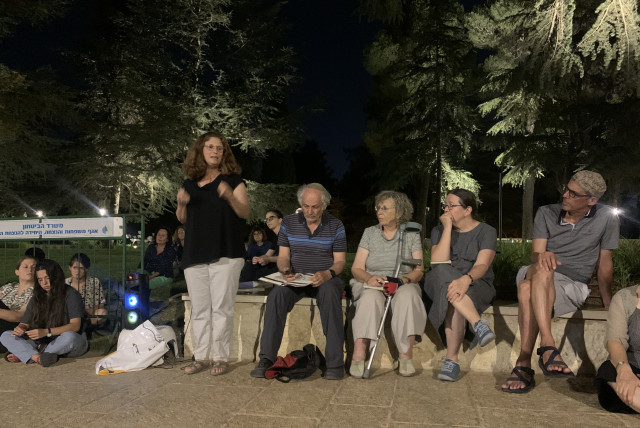  Prof. Michal Muszcat Barkan addresses the crowd at Mount Herzl on the eve of Tisha Be’Av Wednesday night, drawing on themes of political hardship and division (credit: ARIEL SHEINBERG)