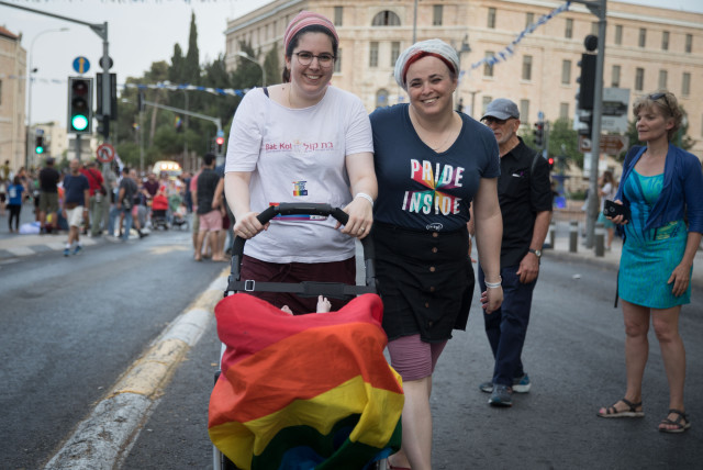  People take part in the annual LGBTQ Pride Parade in Jerusalem, on June 6, 2019.  (credit: NOAM REVKIN FENTON/FLASH90)