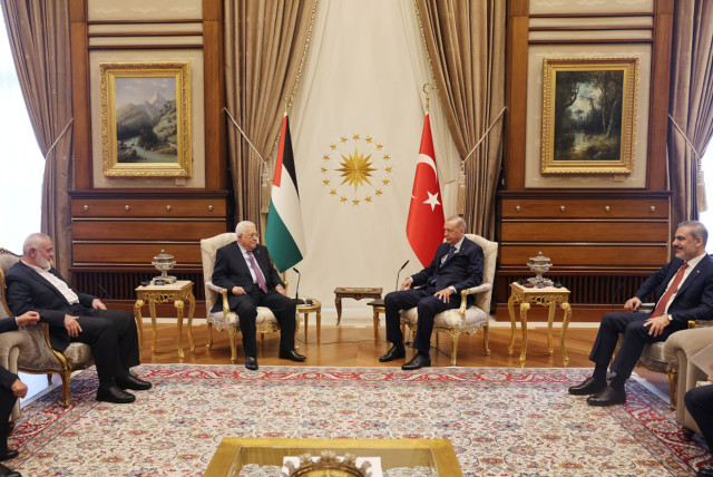  Turkey's President Recep Tayyip Erdogan and Turkish Foreign Minister Hakan Fidan meet with Palestinian President Mahmoud Abbas and Palestinian group Hamas' top leader Ismail Haniyeh at the Presidential Palace in Ankara, Turkey, July 26, 2023. (credit: Palestinian President Office(PPO)/Handout via REUTERS)