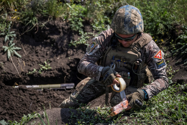  A sapper of 128th separate territorial defense brigade of the Armed Forces of Ukraine takes part in a training, amid Russia's attack on Ukraine, in Donetsk region, Ukraine August 2, 2023. (credit: REUTERS/Viacheslav Ratynskyi)