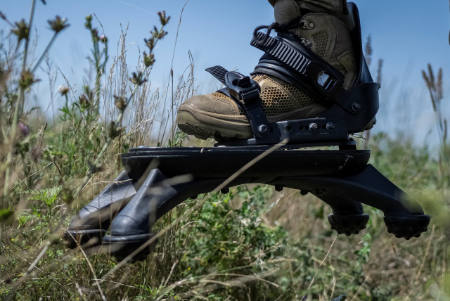  A sapper of 128th separate territorial defense brigade of the Armed Forces of Ukraine wearing ''spider boots'', a protection system that prevents or minimises feet and legs injury, takes part in a training, amid Russia's attack on Ukraine, in Donetsk region, Ukraine August 2, 2023. (credit: REUTERS/Viacheslav Ratynskyi)
