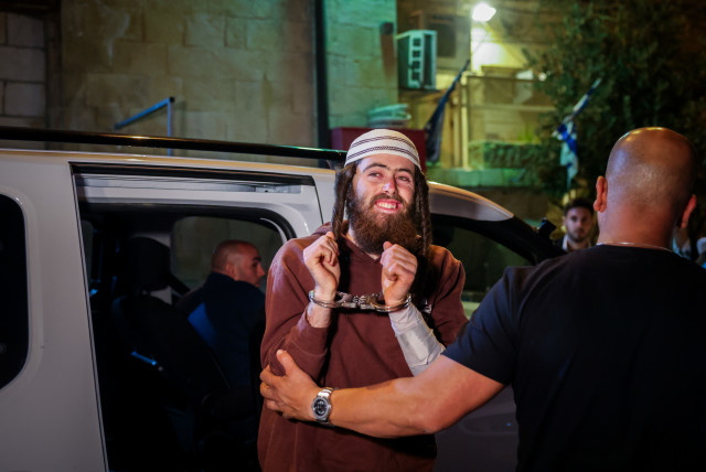 Elisha Yered, suspected of being involved in the death of 19-year-old Palestinian Qusai Jamal Maatan in the West Bank village of Burqa last night, arrives for a hearing at the Jerusalem Magistrate's Court, August 5, 2023. (photo credit: Chaim Goldberg/Flash90)