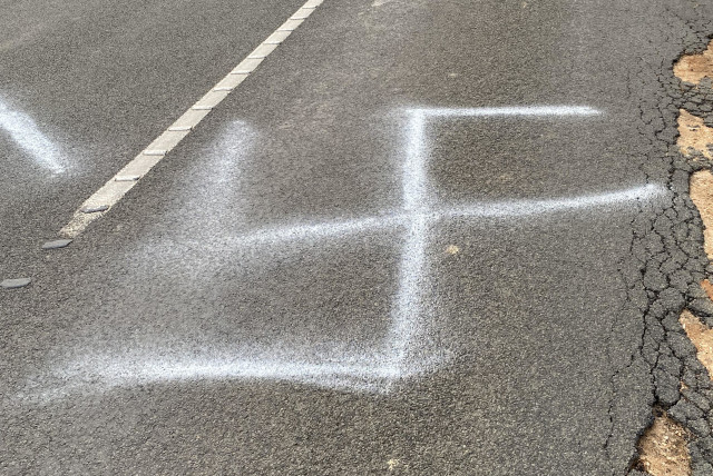 A swastika was painted onto a busy road in Australia. (credit: ANTI-DEFAMATION COMMISSION)