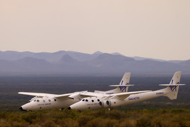  VMS Eve, operated by Virgin Galactic, returns after the company's first commercial flight to the edge of space, at the Spaceport America facility, in Truth or Consequences, New Mexico, U.S., June 29, 2023. (credit: REUTERS/JOSE LUIS GONZALEZ)