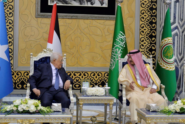  Palestinian President, Mahmoud Abbas, is received by Deputy Amir of Makkah, Prince Badr Bin Sultan, as he arrives to attend the Arab League Summit in Jeddah, Saudi Arabia, May 18, 2023 (credit: SAUDI PRESS AGENCY/HANDOUT VIA REUTERS)