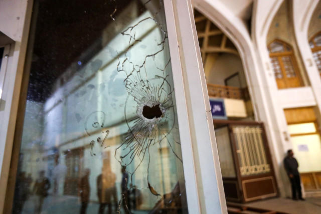  A bullet hole is seen after an attack at the Shah Cheragh Shrine in Shiraz, Iran August 13, 2023 (credit: REUTERS)