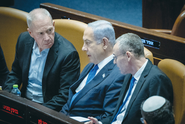  PRIME MINISTER Benjamin Netanyahu confers with Defense Minister Yoav Gallant and Justice Minister Yariv Levin in the Knesset plenum, during voting on the reasonableness legislation last month.  (credit: YONATAN SINDEL/FLASH90)