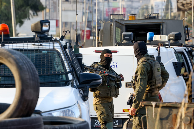  Israeli security forces secure the scene of a shooting attack in Huwara, in the West Bank, near Nablus, August 19, 2023.  (credit: FLASH90)