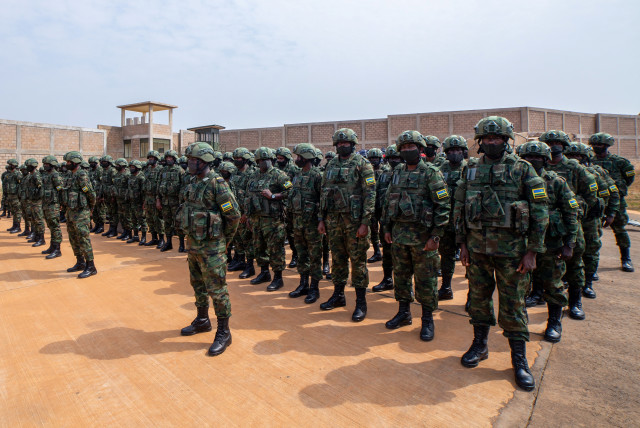  Rwandan military troops depart for Mozambique to help the country combat an escalating Islamic State-linked insurgency that threatens its stability, at the Kigali International Airport in Kigali, Rwanda July 10, 2021. (credit: REUTERS/Jean Bizimana)