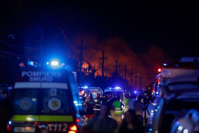  Rescuers work as flames rise after an explosion at a LPG station in Crevedia, near Bucharest, Romania, August 26, 2023. (credit: Inquam Photos/Octav Ganea via REUTERS)