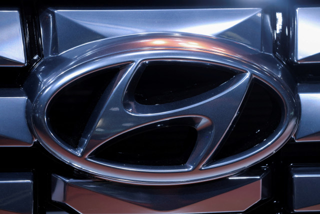  The logo of Hyundai Motor Company is pictured at the New York International Auto Show, in Manhattan, New York City, U.S., April 13, 2022. (credit: Andrew Kelly/Reuters)