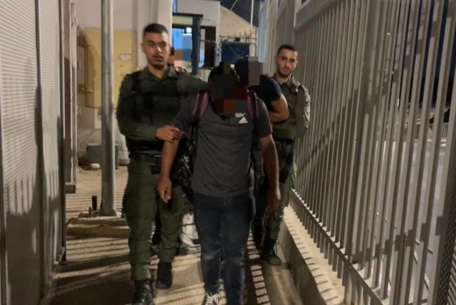  The armed Palestinian suspect caught attempting to cross into Israel on August 28, 2023 (credit: BORDER POLICE)