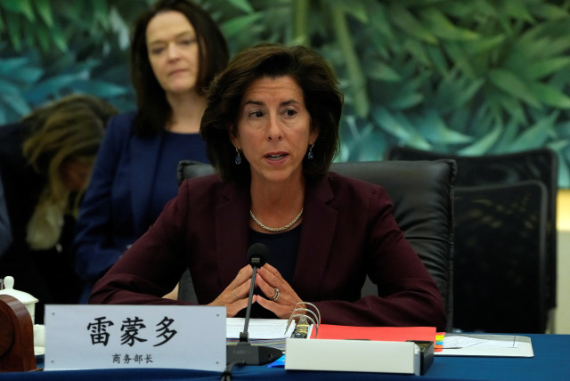  U.S. Commerce Secretary Gina Raimondo, right, speaks during a meeting with her Chinese counterpart Wang Wentao, at the Ministry of Commerce in Beijing, Monday, Aug. 28, 2023. (credit: Andy Wong/Pool via REUTERS)