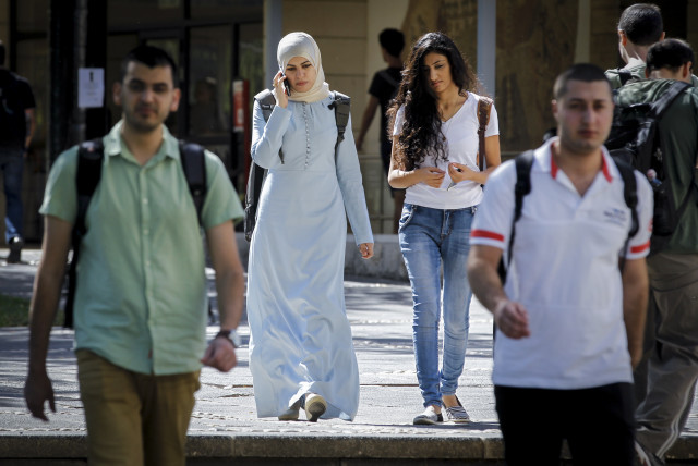  Arab students seen at the campus of ''Givat Ram'' at Jerusalem's Hebrew University on the first day of the new academic year, October 26, 2014. (credit: MIRIAM ALSTER/FLASH90)