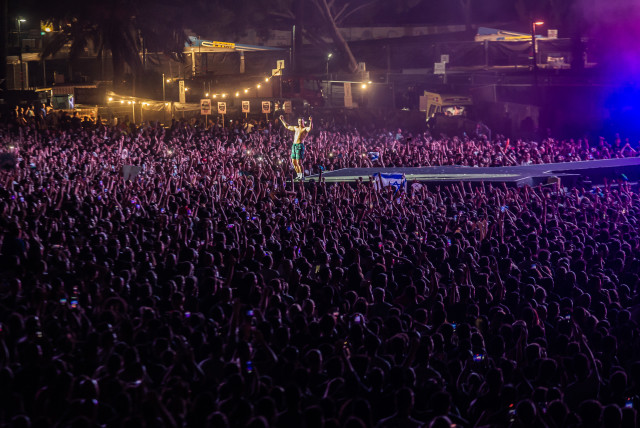  IMAGINE DRAGONS’ lead singer Dan Reynolds enthralls the crowd in Tel Aviv Tuesday night.  (credit: LIOR KETER)