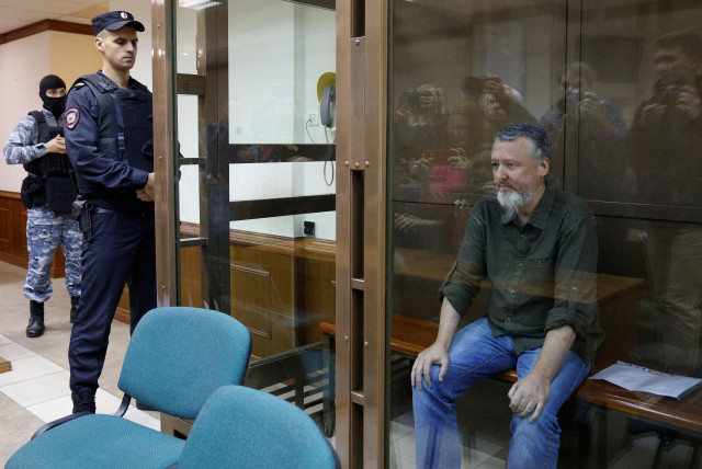  Russian nationalist Kremlin critic and former military commander Igor Girkin, sits behind a glass wall of an enclosure for defendants during a court hearing to consider an appeal against his detention, in Moscow, Russia August 29, 2023. (credit: REUTERS/MAXIM SHEMETOV)