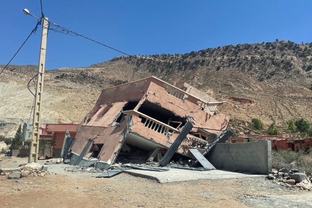 A view shows a damaged building on the road between Amizmiz and Ouirgane, following a powerful earthquake in Morocco, September 9, 2023.  (credit: REUTERS/Ahmed El Jechtimi)