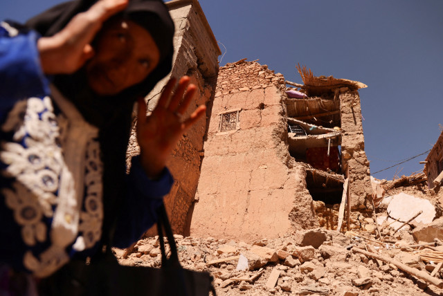  Mohamed Ouchen, 66, a survivor, who helped to pull his sister and her husband with their children from rubble, stands near his destroyed house, in the aftermath of a deadly earthquake, in Tikekhte, near Adassil, Morocco, September 11, 2023. (credit: REUTERS)