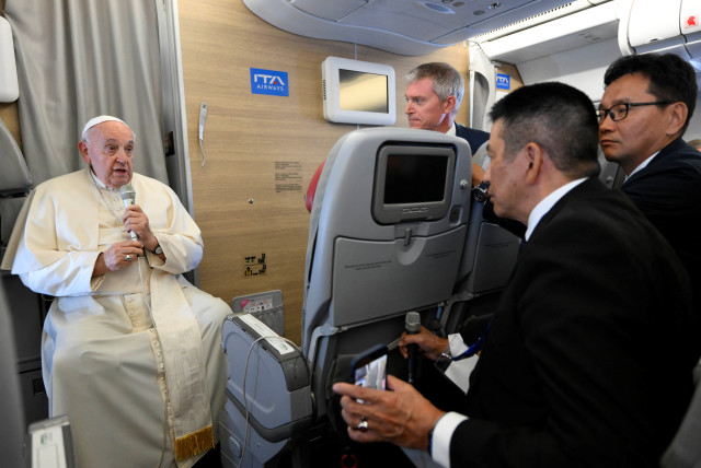  Pope Francis speaks during a press conference aboard the papal plane on his flight back after visiting Mongolia, September 4, 2023.  (credit: VATICAN MEDIA/HANDOUT VIA REUTERS)