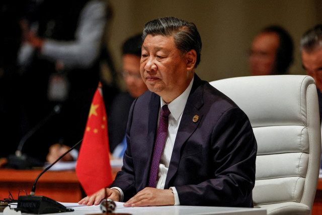  Chinese President Xi Jinping attends the plenary session of the 2023 BRICS Summit at the Sandton Convention Centre in Johannesburg, South Africa on August 23, 2023. (credit: GIANLUIGI GUERCIA/Pool via REUTERS/File Photo)